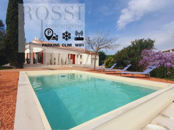 A la foto es mostra l'objecte Villa Carole 15min des plages - Piscine Wi-Fi Clim - ROSSIconciergerie - Linge inclus situat a la ciutat de Lunel.