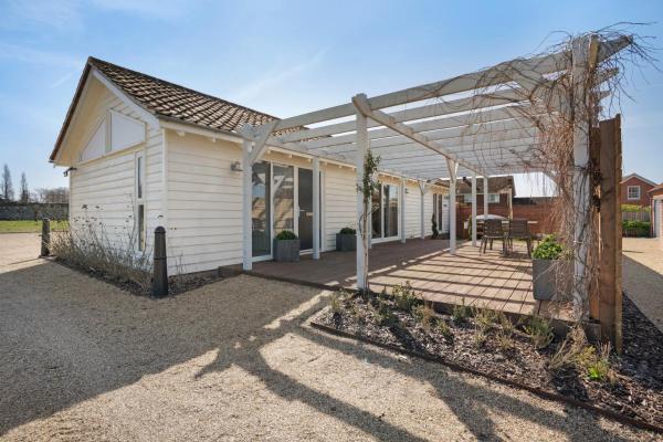 A la foto es mostra l'objecte Orchard Cottage situat a la ciutat de Saint Osyth.