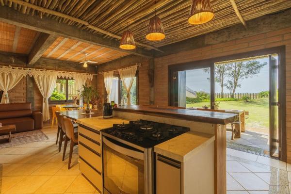 Na fotografii je vidět objekt Casa Mar terreo - Villa Bali nacházející se ve městě Imbituba.