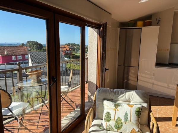 På billedet ses objektet Precioso ático de playa beliggende i byen Ribeira.