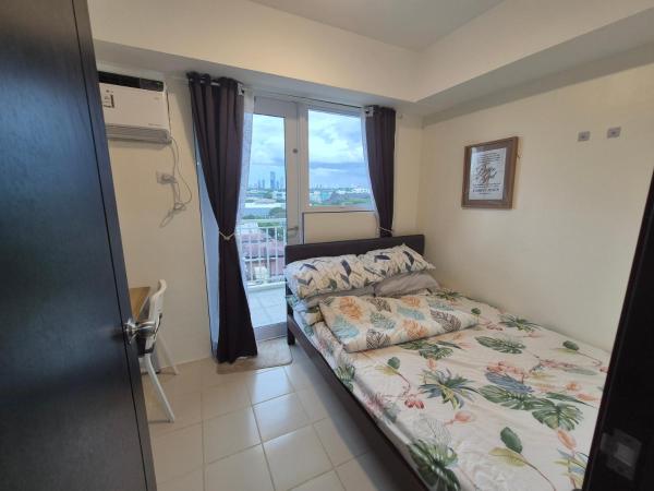 A la foto es mostra l'objecte Kasara Urban Resort Elly's Pad with balcony situat a la ciutat de Pasig.