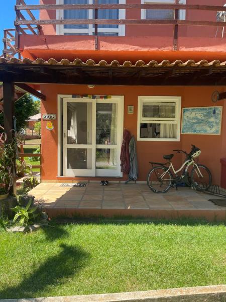 写真にはブジオス市にあるCasa perto do mar, conforto em meio a naturezaが写っています。