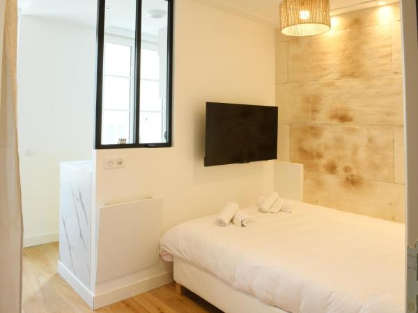 A la foto es mostra l'objecte Le Petit Jacques Cognac Studio situat a la ciutat de Cognac.