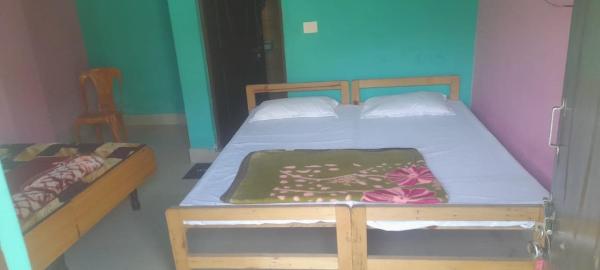 A la foto es mostra l'objecte shiv Ganga residence situat a la ciutat de Maneri.