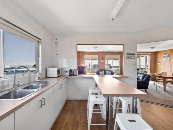 The photo shows the Watts Surf Shack in Gracetown located in the city of Gracetown.