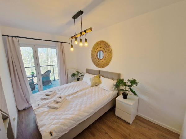 På billedet ses objektet Apartamenty Złote Wydmy - Plażowa Park Międzywodzie beliggende i byen Międzywodzie.