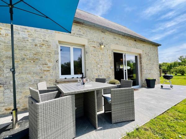 A la foto es mostra l'objecte Au Ptit Gardin - 10 minutes from Utah Beach situat a la ciutat de Sébeville.