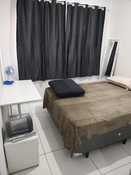 写真にはCarambeí市にあるApartamento 01 quarto cama casal com wi-fiが写っています。