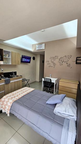 照片显示了位于Cuautitlán市的A07 Premium Mini Suite WHITE Cocina Terraza Companies Work Teams 1-2 PAX物件。