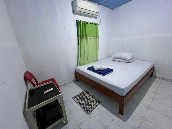 Na fotografii je vidět objekt Ipoeng Rest Bed & Breakfast nacházející se ve městě Gorontalo.