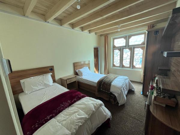 Auf dem Foto ist das Objekt Musofir Khona Family Guest House in der Stadt Hussaini zu sehen.