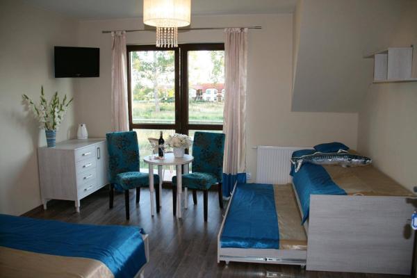 Na fotografii je vidět objekt Villa Pomerania nacházející se ve městě Rowy.