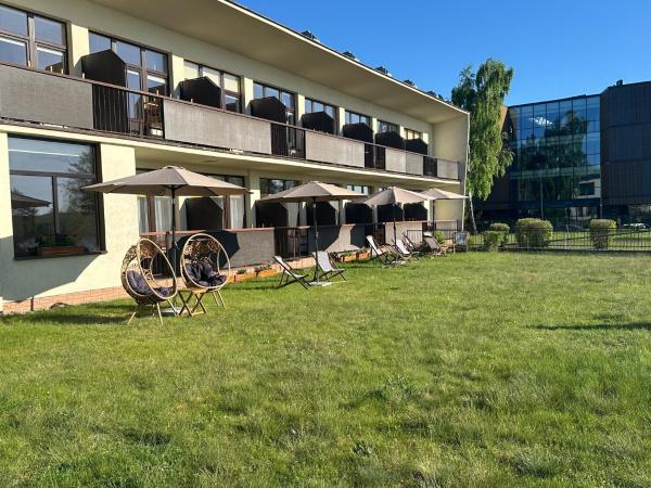 På billedet ses objektet KAMERALNY przy promenadzie - pokoje beliggende i byen Charzykowy.