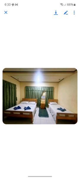 På billedet ses objektet Dela-Chen Roadside Hostel beliggende i byen Saavedra.