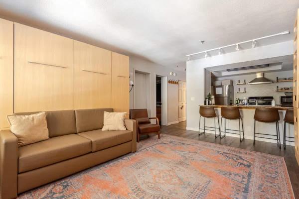 Foto 5: Super-Efficient Studio with Full Kitchen Balcony & Smart Sleeping Options