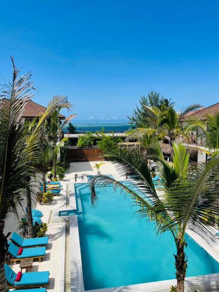 The photo shows the Sand Beach Boutique located in the city of Bwejuu.