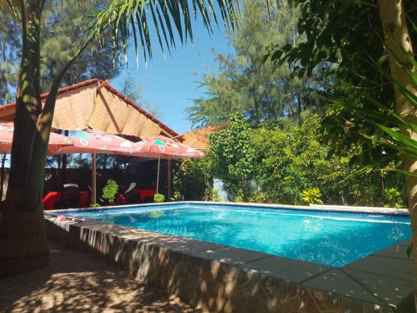 Na zdjęciu widoczny jest obiekt Moony’s Chalets & Camping położony w mieście Machangulo.