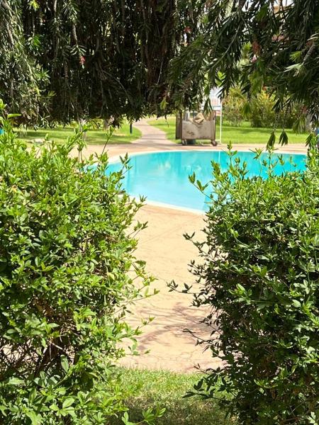 Na fotografii je vidět objekt A Cosy Maison avec un accès direct à la piscine nacházející se ve městě Marakéš.