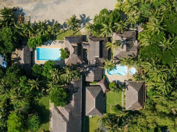 На фото показан объект Nabulao Beach Resort, расположенный в городе Hinoba-an.