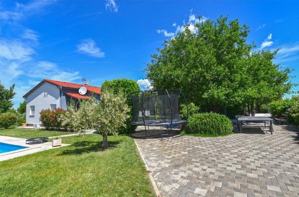 Na foto é possível ver o objeto Ferienhaus mit Privatpool für 6 Personen ca 85 qm in Pula, Istrien Istrische Riviera localizado na cidade de Valdebek.