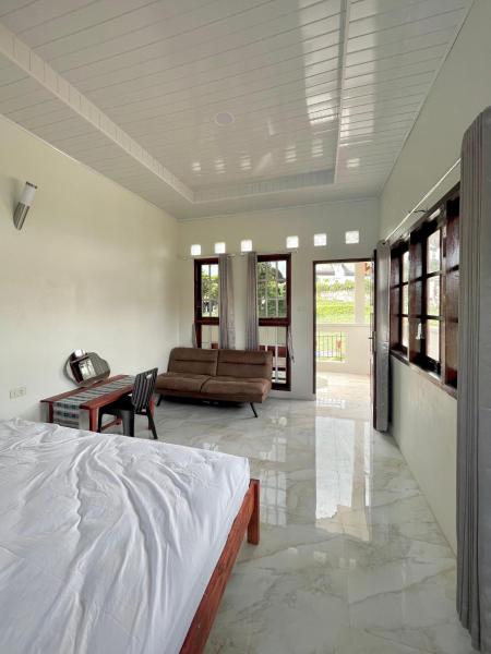 A la foto es mostra l'objecte Caesarea Guesthouse situat a la ciutat de Berastagi.