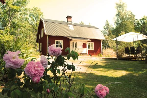 En la foto se muestra el objeto Ferienhaus Grimsebo in idyllischer Alleinlage - Natur pur! ubicado en la ciudad de Krogsfall.