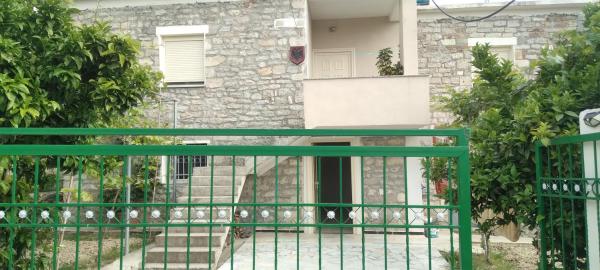 The photo shows the The Stone House located in the city of Cfir.