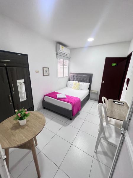 Na fotografii je vidět objekt Garden Home Hostal nacházející se ve městě Ciudad Jardín.