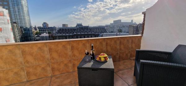 A la foto es mostra l'objecte Baroque Style Duplex With Scenic Views of City Centre situat a la ciutat de Bucarest.