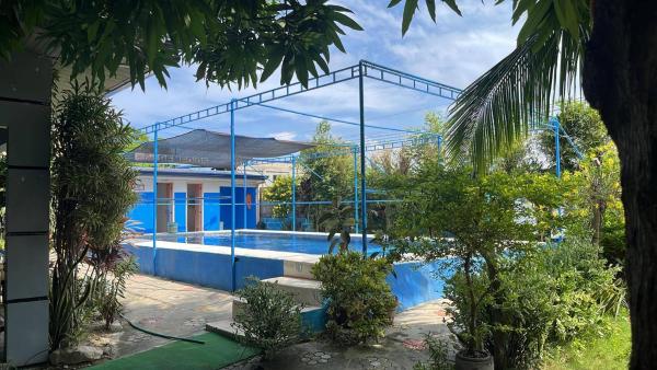 The photo shows the Rudy's Inn by Villa Remedios Resort located in the city of Balibago.
