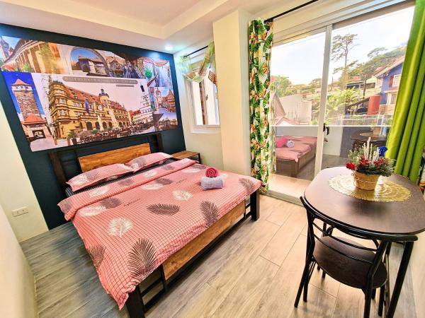 Nella foto è visibile l'oggetto #3 Baguio City I Service Apartment I Deutsches Guesthouse & Homestay Baguio I Walking distance to Lourdes Grotto and nearby tourist attractions situato nella città di Baguio.