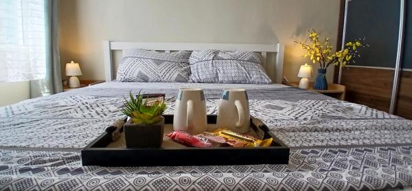 På billedet ses objektet Mike's Residence at Marina Spatial - Dumaguete City beliggende i byen Piapi.