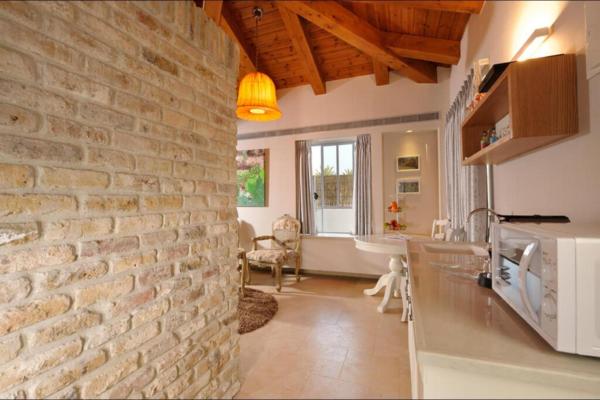 A la foto es mostra l'objecte אחוזת הכורמים חד נס - סוויטות עם Hot-tub פרטי situat a la ciutat de Had Nes.