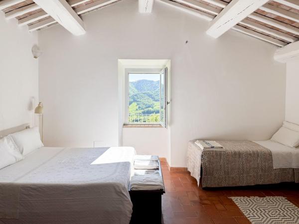 På billedet ses objektet AGRITURISMO BUON VENTO, Appartamento PICCOLI SOLI una chic country house in Gubbio Italy beliggende i byen Gubbio.