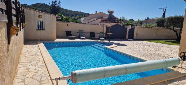På billedet ses objektet PROMOTION sur la dernière semaine d'Août en Occitanie - villa avec piscine privée beliggende i byen Beaucaire.