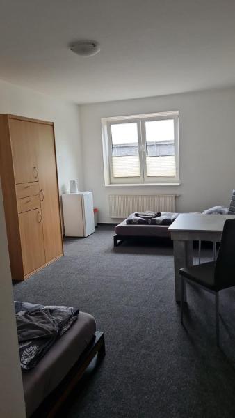 A la foto es mostra l'objecte Zweibettzimmer mit eigenem Bad situat a la ciutat de Rostock.