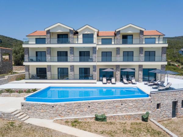 A la foto es mostra l'objecte Veslo Sea Blue Apartments - Lustica situat a la ciutat de Merdari.