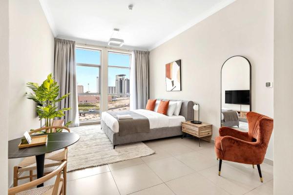 Na fotografii je vidět objekt Silkhaus furnished studio in Art Gardens with pool access nacházející se ve městě Dubaj.