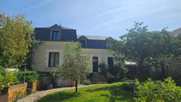 A la foto es mostra l'objecte Gite Au Coeur de Tours, familial avec jardin au calme, parking situat a la ciutat de Tours.