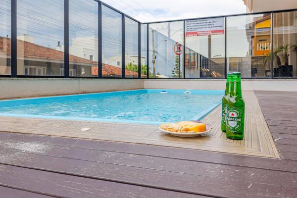 A la foto es mostra l'objecte Apartamento a 150 Metros da Praia com Piscina situat a la ciutat de Bombas.