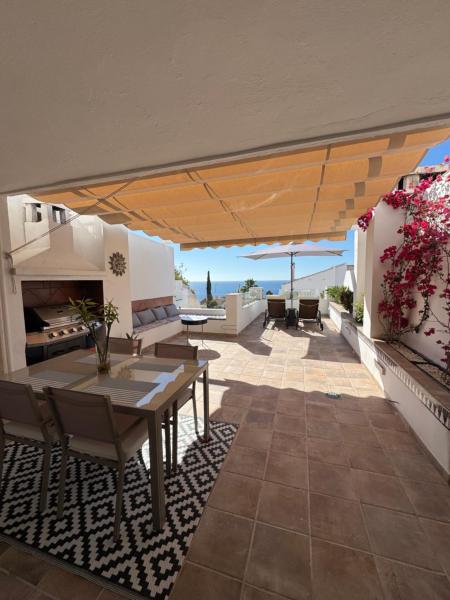 A la foto es mostra l'objecte El tesorillo tropical house situat a la ciutat de Almuñécar.