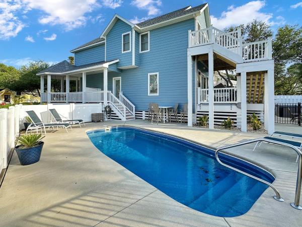 A la foto es mostra l'objecte Renovated Cottage With Heated Pool Spa & Amenities situat a la ciutat de Corolla.