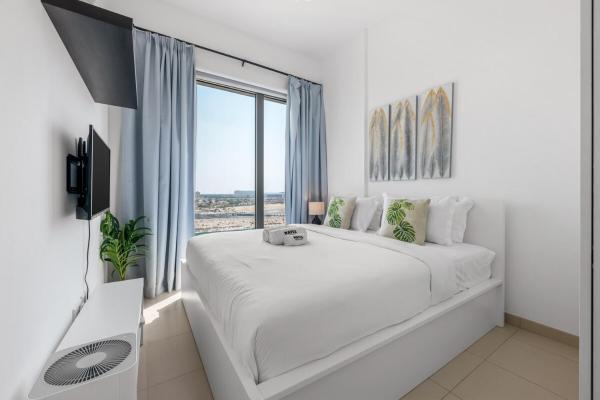 Foto 4: Waves - Stylish Blue Haven near Town Square Park