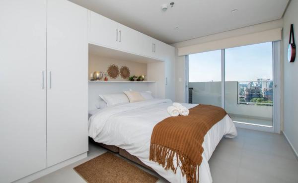 A la foto es mostra l'objecte 1BR w/ Stunning City Views Fully Equipped situat a la ciutat de Asunción.