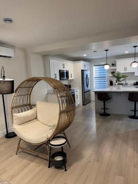 The photo shows the New Luxury 4-Bedroom Getaway, Free Parking, Patio located in the city of St. John's.
