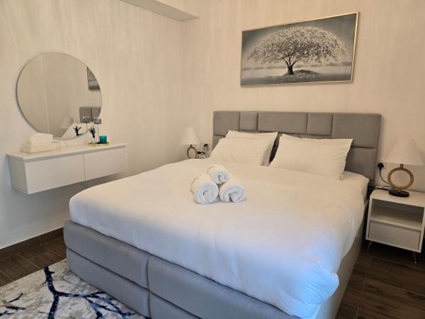 A la foto es mostra l'objecte SVIZONA's 1BHK in Al Furjan situat a la ciutat de Dubai.