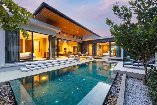 The photo shows the Exclusive 3BR Magnum Villa With Private Pool by TropicLook located in the city of Ban Pak Lak.