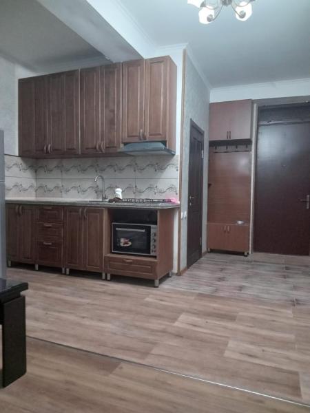 Na zdjęciu widoczny jest obiekt A cozy corner im Saburtalo 3 położony w mieście Itʼkhvisi.