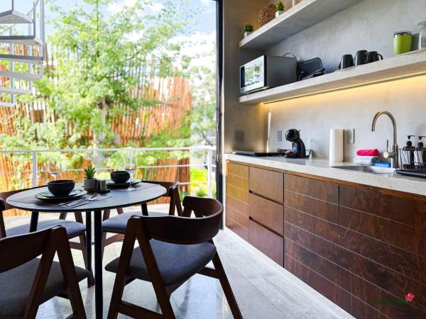 Na zdjęciu widoczny jest obiekt Private Pool & Grill 2 Bedroom Apartment 417 Selva położony w mieście Tulum.