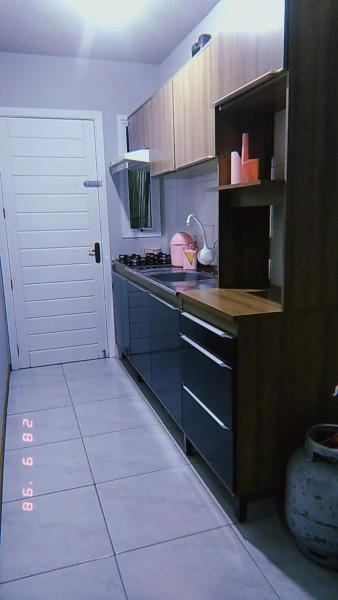 Στη φωτογραφία φαίνεται το αντικείμενο Apartamento Mobiliado που βρίσκεται στην πόλη Eldorado do Sul .